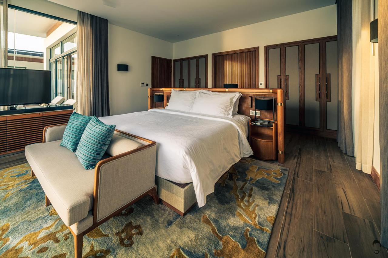 Moevenpick Villas & Residences דואונג דונג מראה חיצוני תמונה A bedroom at the hotel