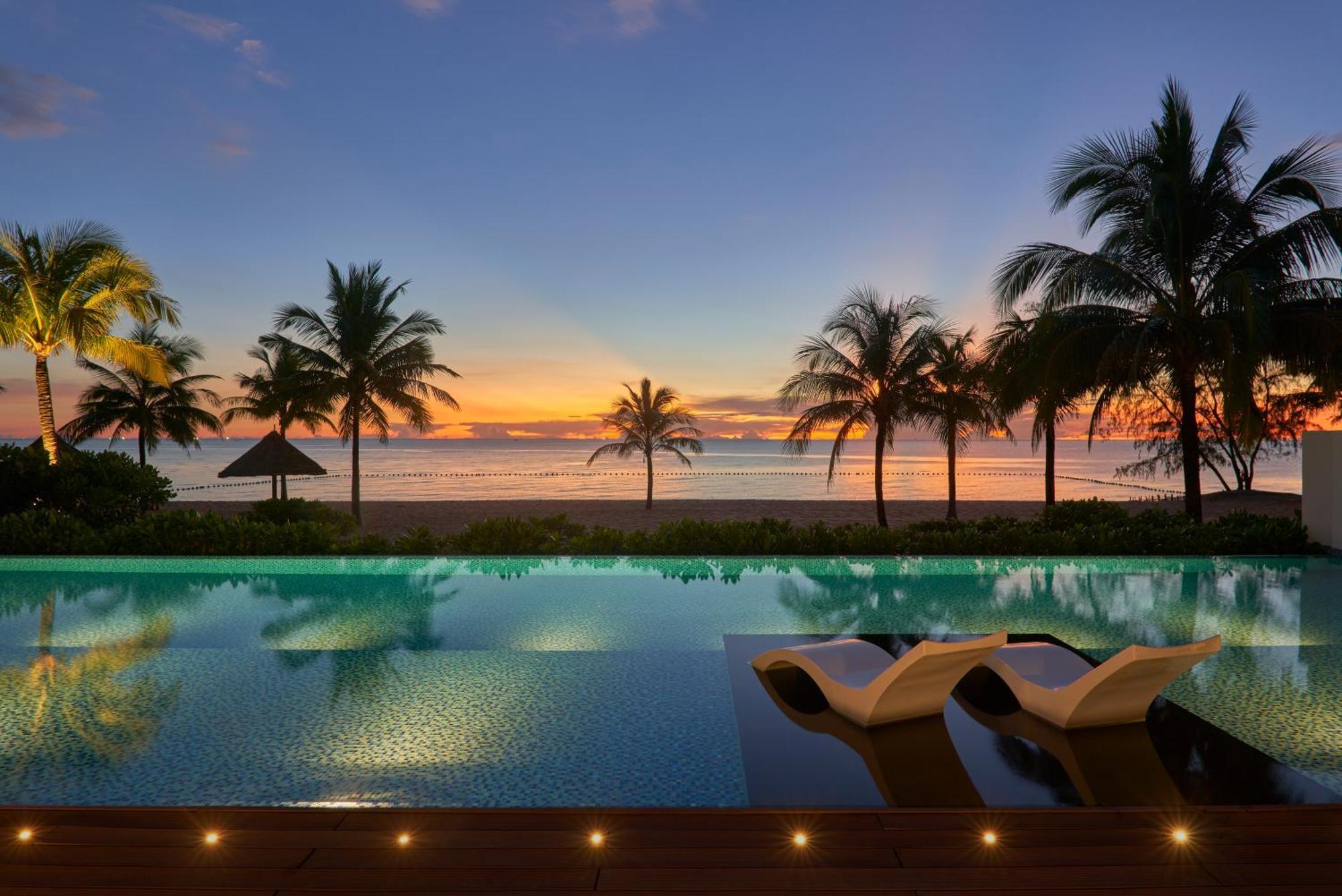 Moevenpick Villas & Residences דואונג דונג מראה חיצוני תמונה Sunset at the beach